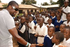 Chris Tucker with Tanzanian school children