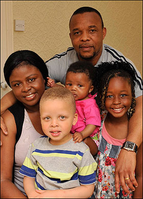 Has baby family white black The black