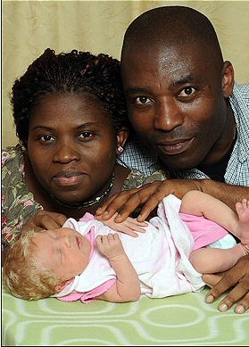Black white baby family Black parents